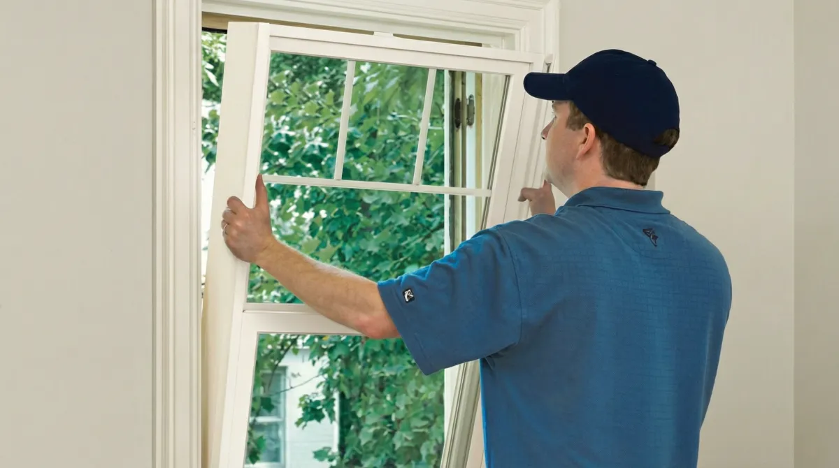 Professional contractors performing a residential window insulation and replacement service in Anaheim, CA